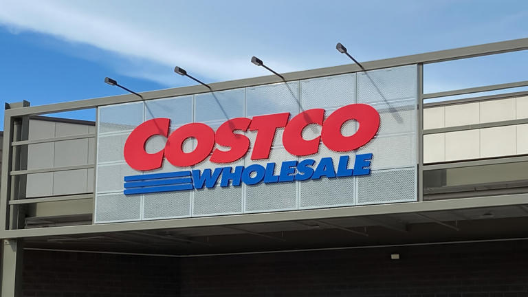 costco wholesale logo storefront sign_iStock-1266180932