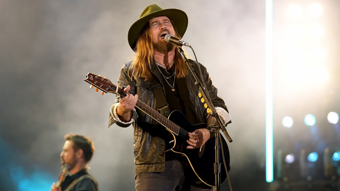 <ul> <li><strong>Hometown:</strong> Flatwoods</li> </ul> <p>Billy Ray Cyrus is a country singer, songwriter, and actor. He first rose to prominence with his hit song, “Achy Breaky Heart. This song not only topped the country charts, it achieved triple-platinum status in Australia, as well as repopularizing the line dance. Since then, Cyrus has had a prolific career, recording 16 studio albums featuring over 50 hit songs.</p> <p>Though Cyrus continued to hit platinum with his releases, he earned his first number-one single in 2019 after appearing on Lil Nas X’s song “Old Town Road.” In addition to music, Cyrus has also had a successful acting career. His credits include “Mulholland Drive,” “The Nanny,” “Diagnosis Murder,” and “Love Boat.” Cyrus is the father of equally successful singer-songwriter Miley Cyrus.</p>