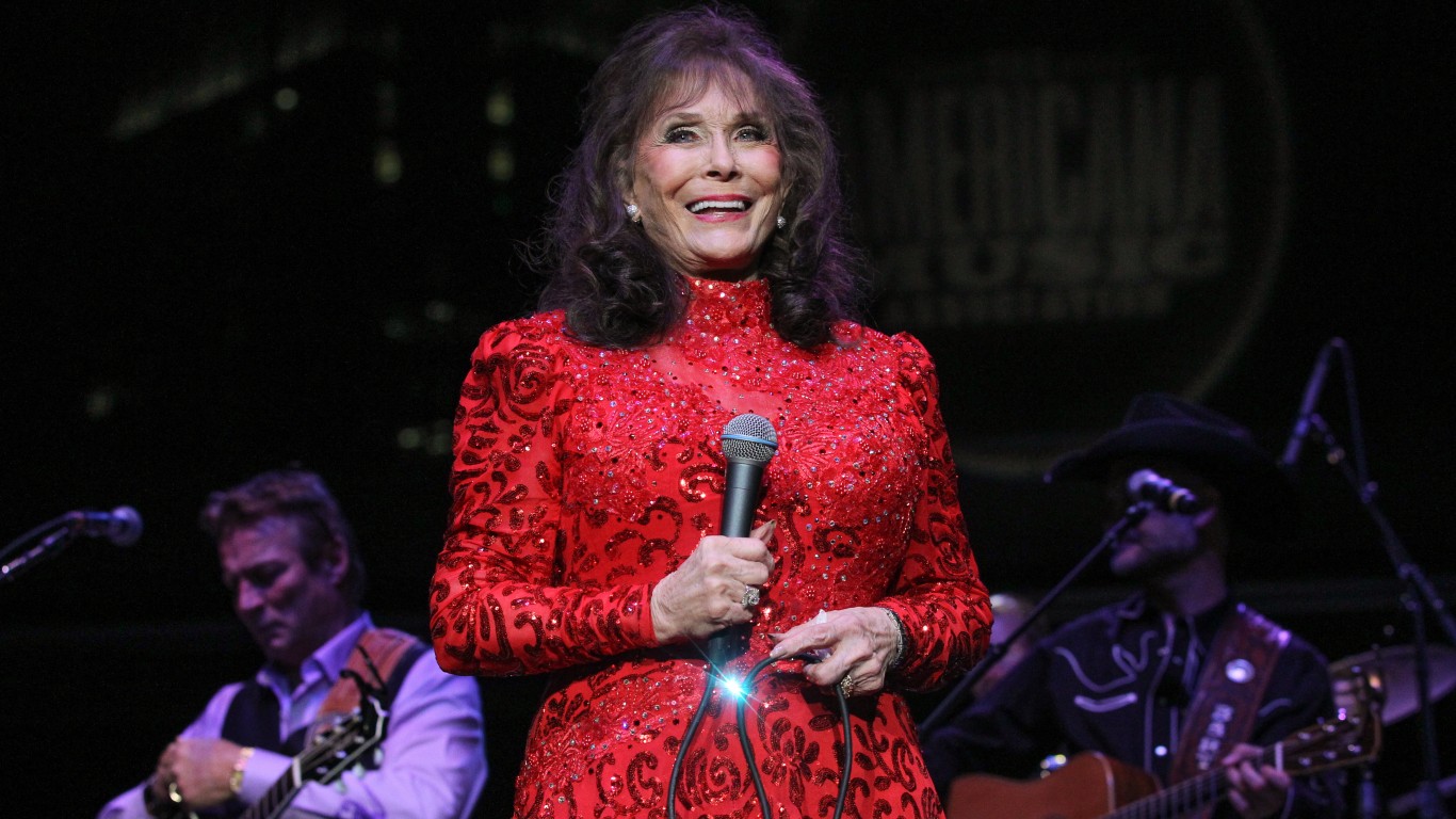 <ul> <li><strong>Hometown:</strong> Butcher Hollow</li> </ul> <p>One of the biggest musicians from Kentucky is Loretta Lynn. She first got started in music playing in local clubs before she was spotted by a representative from Zero Records. This led to a widely successful music career, spawning numerous hit songs like “Coal Miner’s Daughter” and “I’m a Honky Tonk Girl,” as well as the musical film “Coal Miner’s Daughter” based on her life.</p> <p>Known for her groundbreaking role in country music, Lynn received many accolades for her work. Besides awards from the Country Music Association and the Academy of Country Music, Lynn was nominated for 18 Grammy Awards, winning three. As of 2022, Lynn is history’s most-awarded female country music artist. She died of natural causes the same year.</p>
