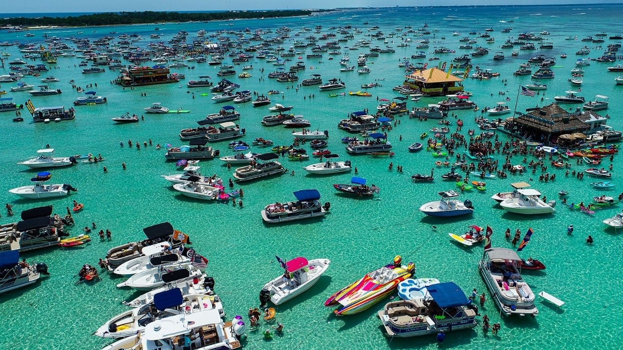 <p><span><em>You may have been to <a href="https://wealthofgeeks.com/best-beaches-in-florida/">Florida beaches</a>, but have you been to a sand bar?</em> Crab Island is one of the most popular Destin attractions. It’s a famous sand bar where people boat to and enjoy all day long. Find floating obstacle courses, bars, and good times. The water depth varies from 1-4 feet deep, and the only way to access Crab Island is by boat. The local boat rental companies expertly navigate guests in the right direction.</span></p>