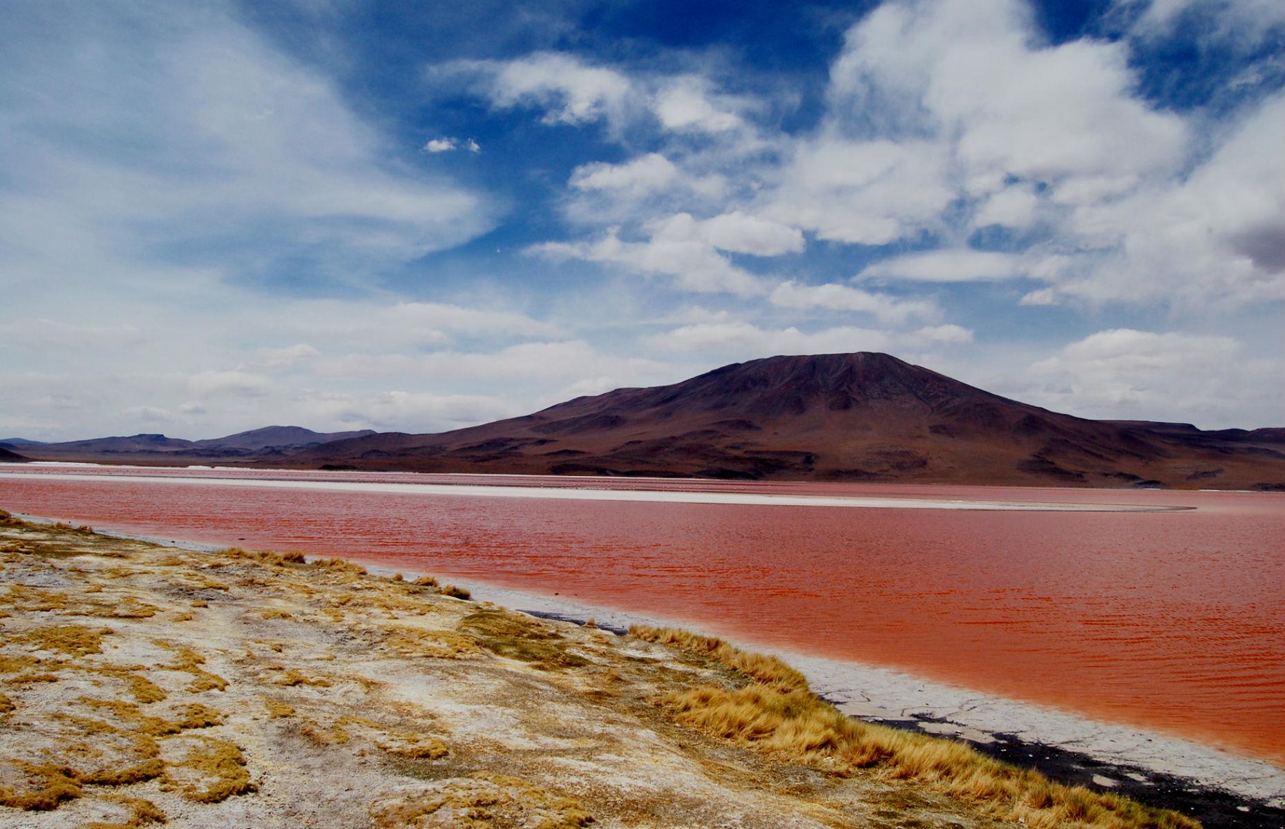 <p>Close to the borders with Chile and Argentina, and at Bolivia’s southernmost tip, you can see some of the planet’s most colorful, striking landscapes in the form of the fiery Laguna Colorado and the emerald Laguna Verde. Both aesthetic marvels, the lakes have turned their striking colors thanks to fortuitous geographical occurrences.</p>