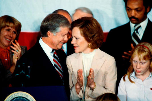 President Jimmy Carter is applauded by First Lady Rosalynn Carter and supporters after conceding defeat to Reagan during the 1980 presidential election, Nov 4, 1980.