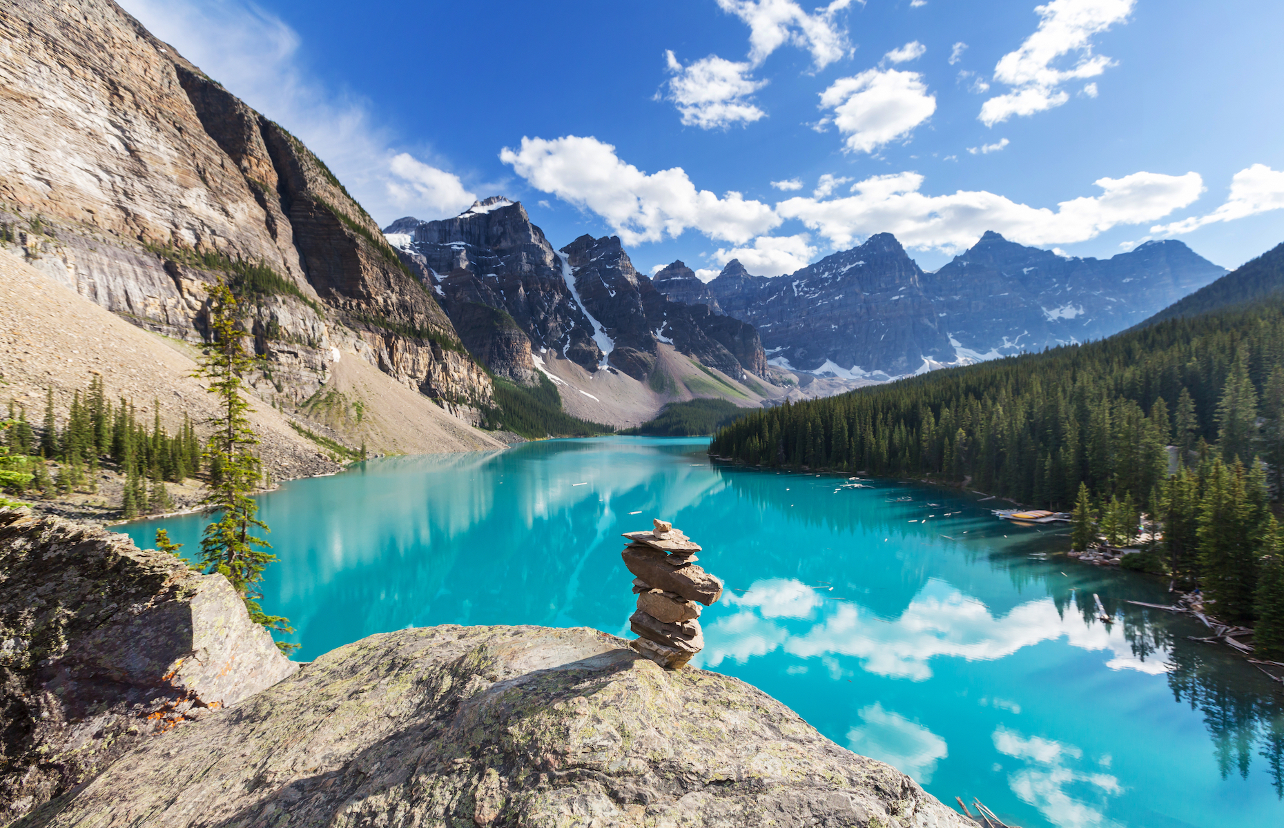 <p>Featuring stunning Rocky Mountain peaks and picture-perfect turquoise glacial lakes, <a href="https://www.pc.gc.ca/en/pn-np/ab/banff">Banff National Park</a> offers plenty of year-round activities from skiing and golf to cycling, climbing, and more. <a href="https://www.banfflakelouise.com/moraine-lake">Moraine Lake</a> (pictured) and <a href="https://www.banfflakelouise.com/lake-louise">Lake Louise</a> are two of the most photographed landmarks in the park.</p>