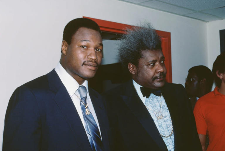 American heavyweight boxer Larry Holmes with American boxing promoter Don King, circa 1983 | Getty Images | Photo by Vinnie Zuffante