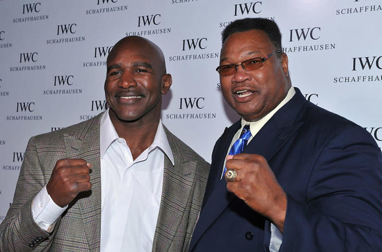 Evander Holyfield and Larry Holmes attend the IWC Flagship Boutique New York City | Getty Images | Photo by Fernando Leon