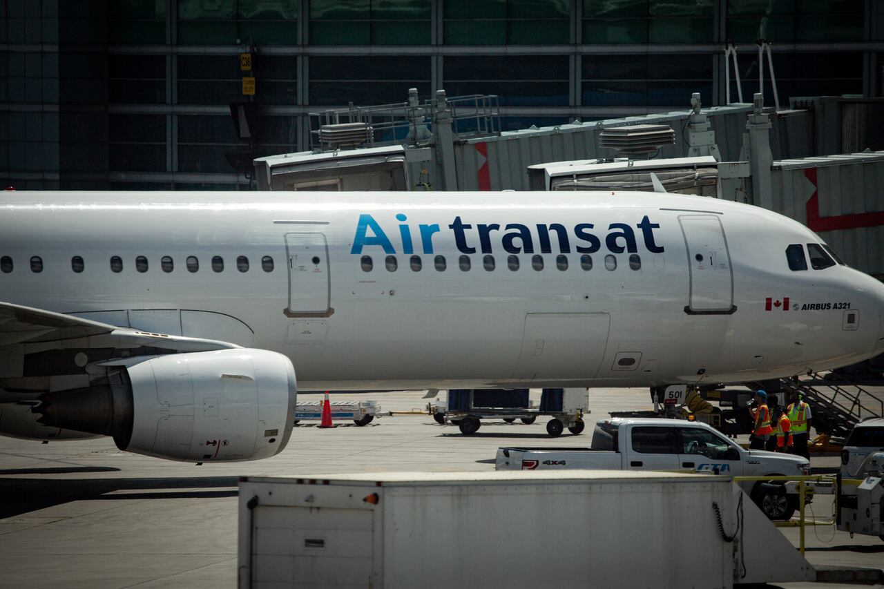 air transat faces strike as soon as january after 2,100 workers overwhelmingly vote in favour of walkout