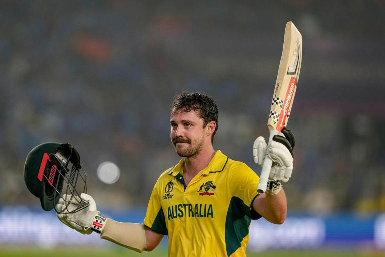 Australia's Travis Head acknowledges the crowd as he walks off the ground after his dismissal during the ICC Men's Cricket World Cup 2023 final match against India. (Photo | PTI)
