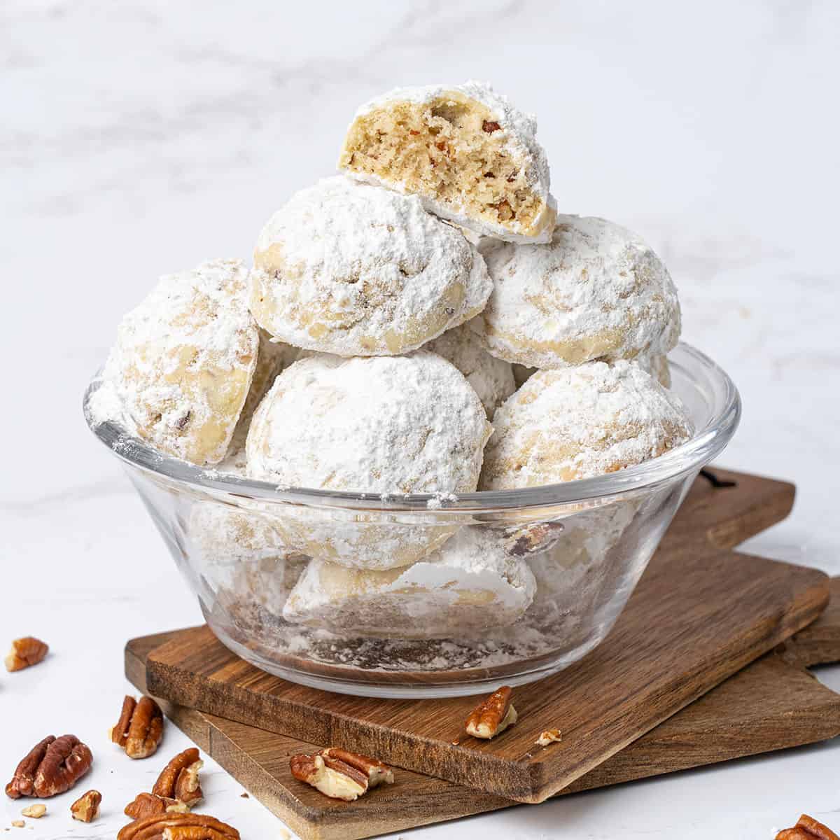 <p>These sweet, crunchy, and buttery <strong><a href="https://www.spatuladesserts.com/pecan-snowball-cookies/">pecan snowball cookies</a></strong> are a delicious way to decorate your dessert table this holiday season! Also known as Mexican wedding cookies or Russian tea cookies, these snowy treats use just a handful of basic pantry staples to create a fun-shaped and eye-catching dessert that all ages will love. It is one of the best Christmas cookie recipes for your December parties and even better when wrapped up as a gift!</p><p><strong>Go to the recipe: <a href="https://www.spatuladesserts.com/pecan-snowball-cookies/">Pecan Snowball Cookies</a></strong></p>
