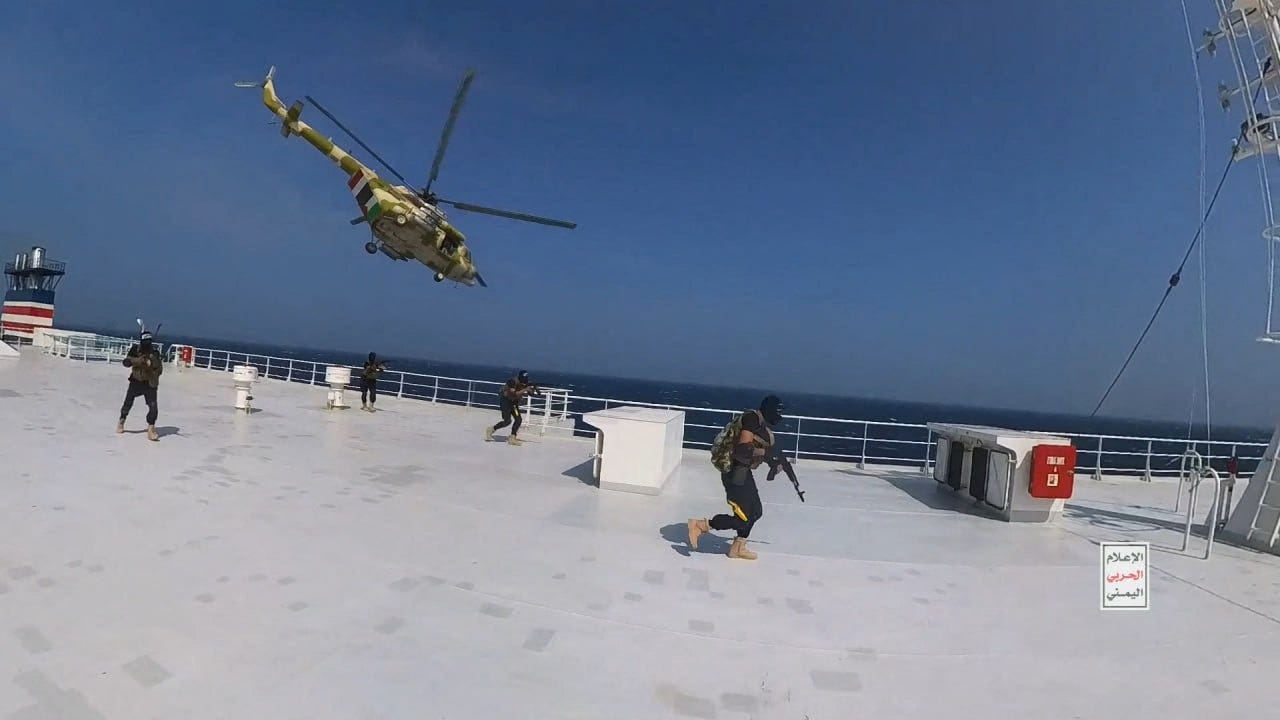 chilling video shows iran-backed rebel commandos hijack a cargo ship during a helicopter raid