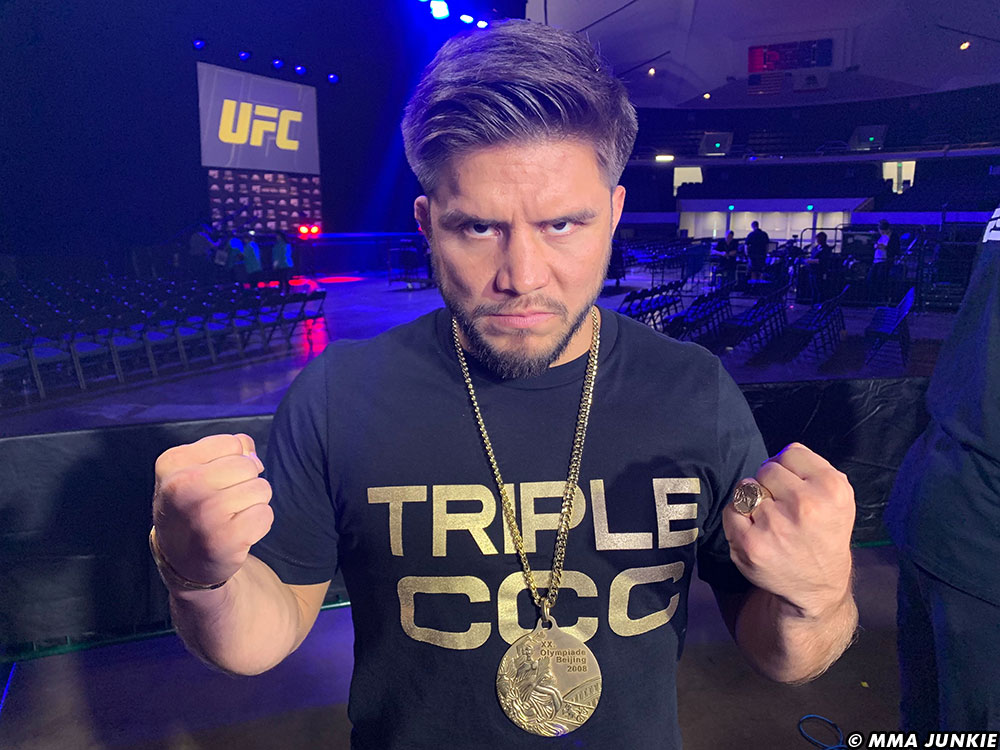 henry cejudo takes exception to daniel cormier comparing his olympic gold medal to tom aspinall's interim title