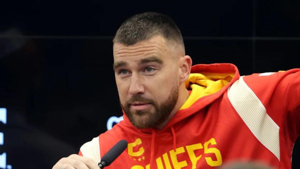 Travis Kelce talks to the media during a Kansas City Chiefs press conference in November 2023 (Credit: Alex Grimm/Getty Images)