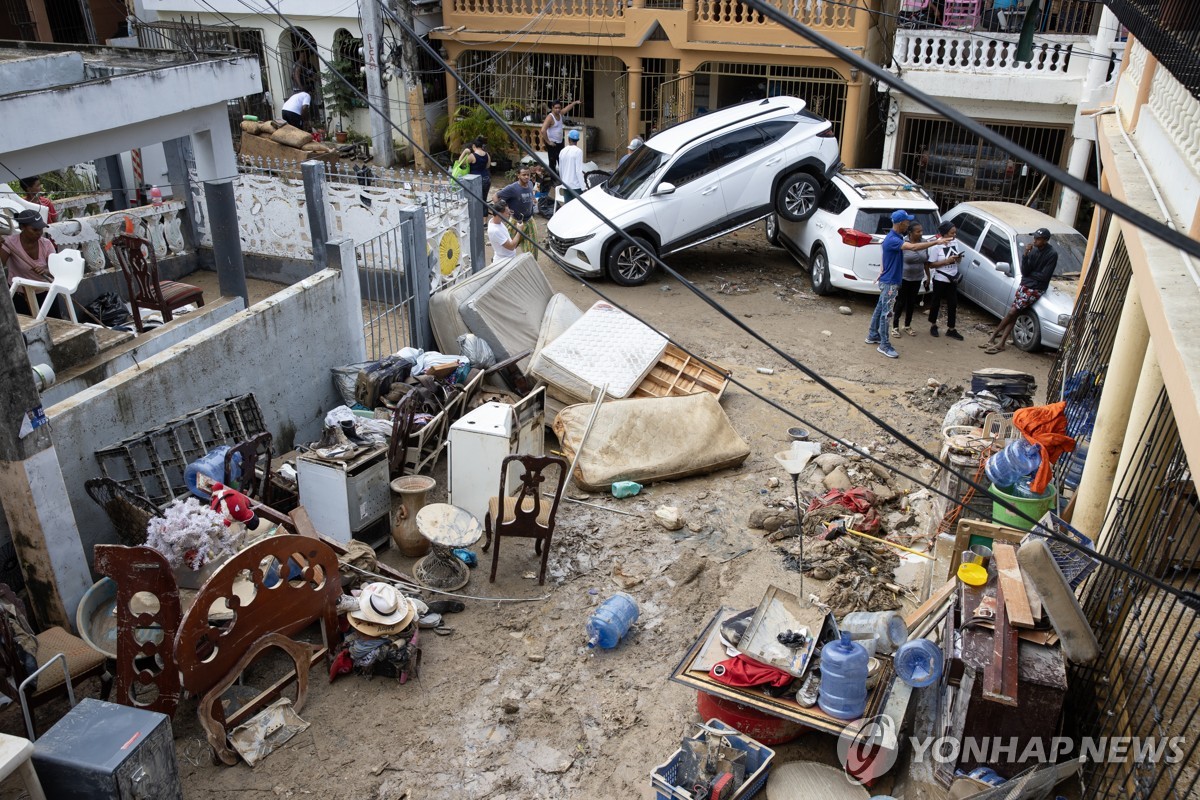 At Least 21 Dead As Dominican Republic Faces Record Heavy Rains   AA1kgYF0.img