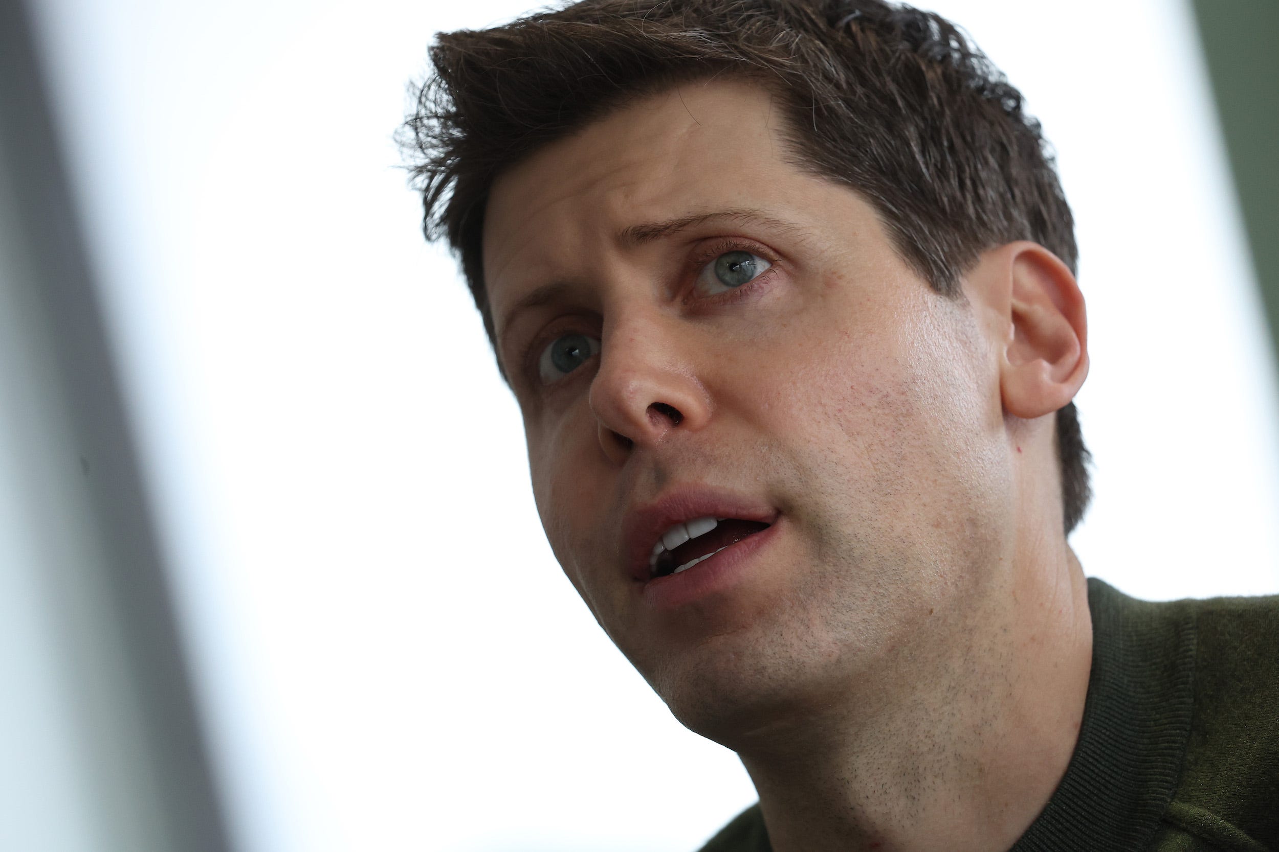 sam altman says his iphone broke after being fired from openai because it was overwhelmed with messages