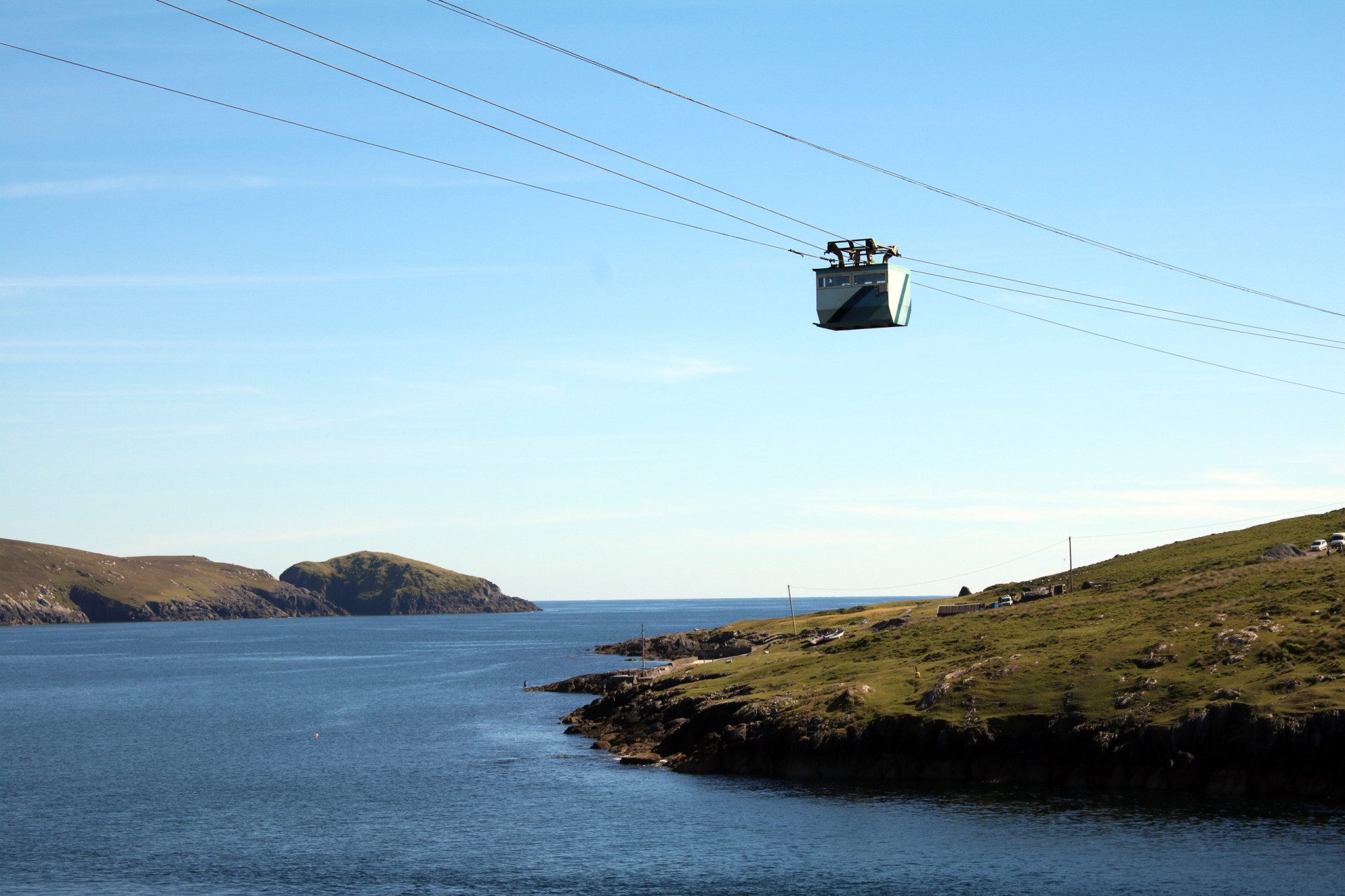 <p>The island lies in a narrow sound that's reachable by cable car, the only one in Ireland. The journey takes only 10 minutes.</p>