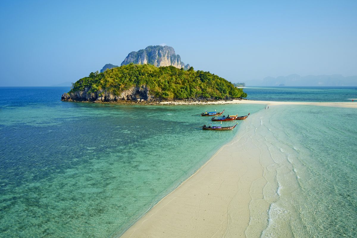 <p>The southern region of <a href="https://www.tourismthailand.org/Home">Thailand</a> boasts a truly breathtaking natural landscape. Alongside its surreal white sand beaches, the prominence of limestone cliffs emerging from the tranquil Andaman Sea are remarkable marvels.</p><p>Beyond their aesthetic appeal, these rock structures serve as a dreamscape for avid climbers, with Railay Beach emerging as one of Krabi's most sought-after destinations. The <a href="https://krabirockclimbing.com/">Krabi Rock Climbing</a> School offers a variety of climbing courses for beginners, intermediate, and advanced climbers. They also have private options if you prefer one one-on-one instruction, or if you simply want a great climbing partner who knows the area</p>
