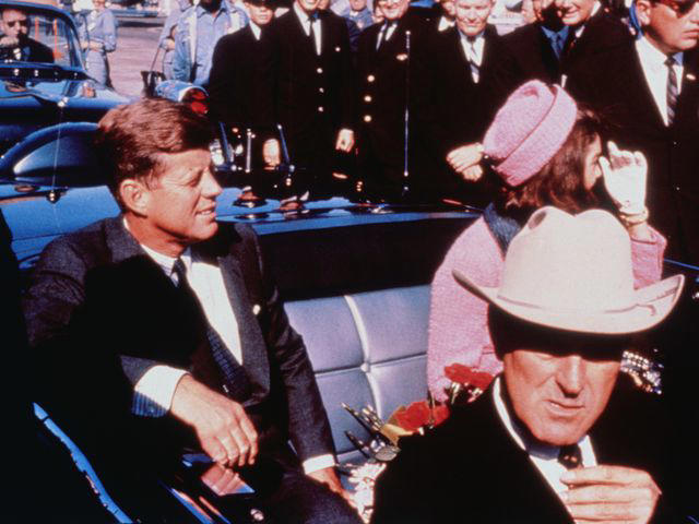 Bettmann US President John F Kennedy, First Lady Jacqueline Kennedy, Texas Governor John Connally, prepared for motorcade into the city from the airport in Dallas, Texas, on November 22, 1963.