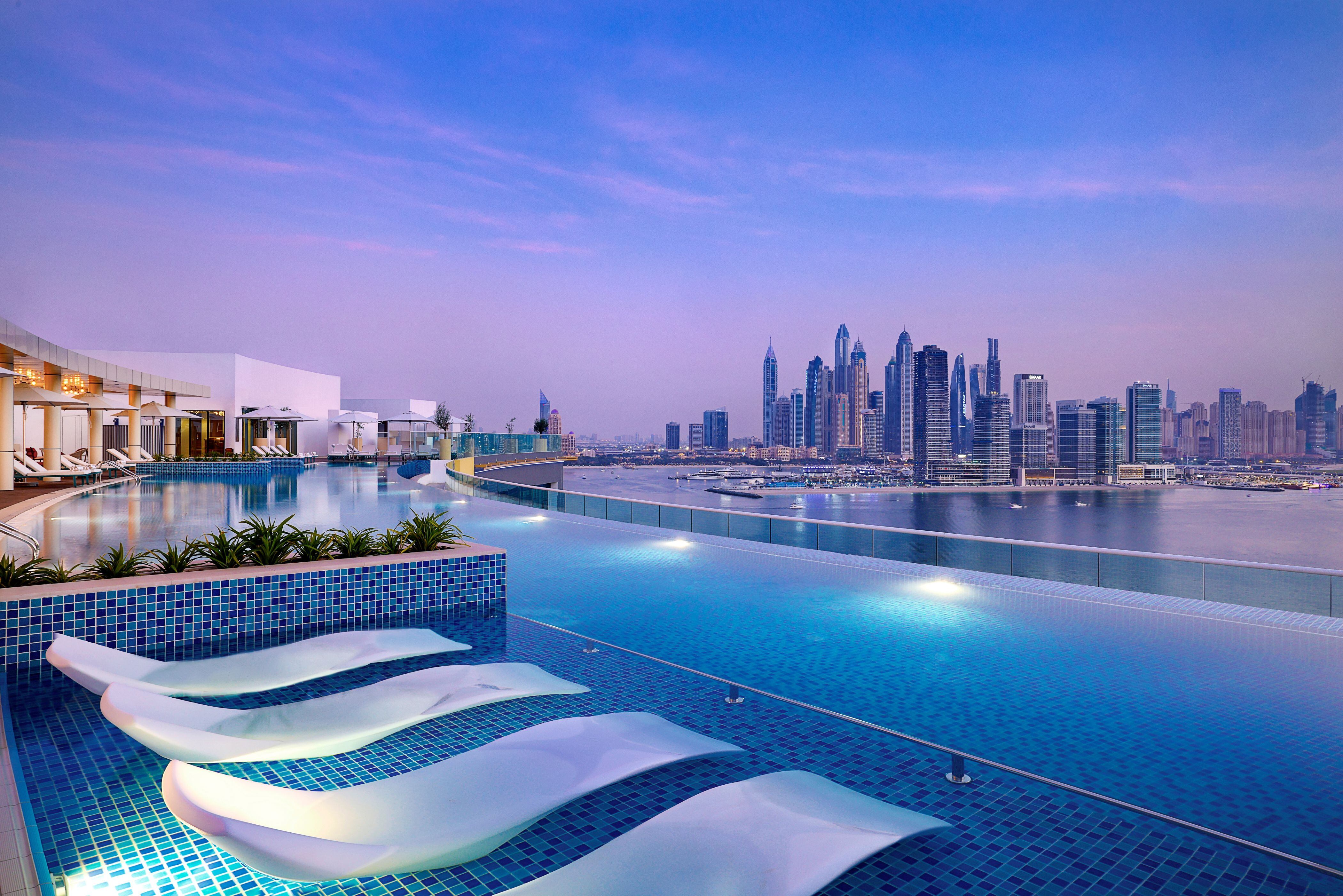 nh collection dubai has palm west beach's best pool – hotel insider
