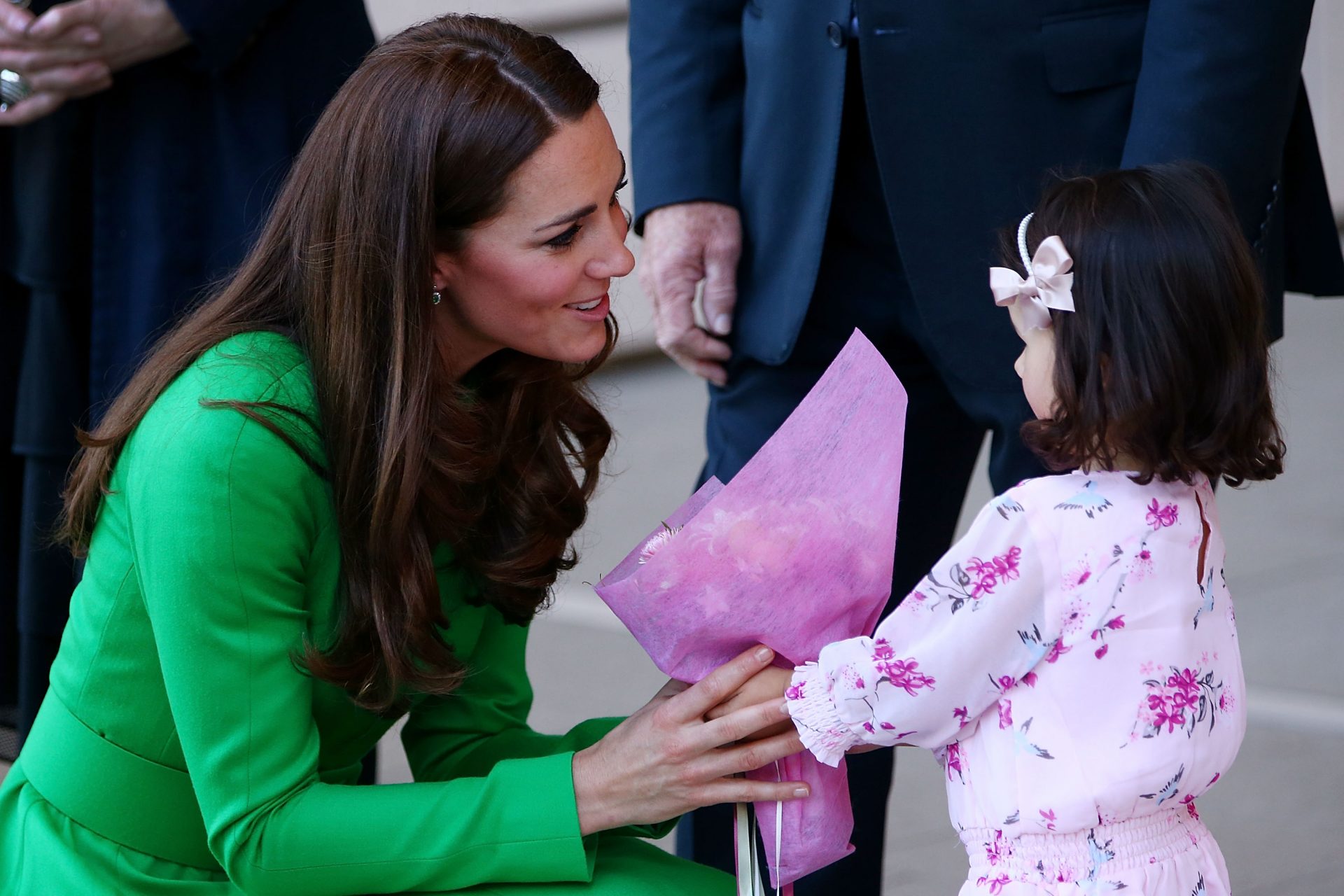 <p>Princess Catherine loves to interact with children along the route. At the time of this picture, her son George was almost 1 year old. Roughly a year after this photo, she would have her second child, Charlotte.</p>