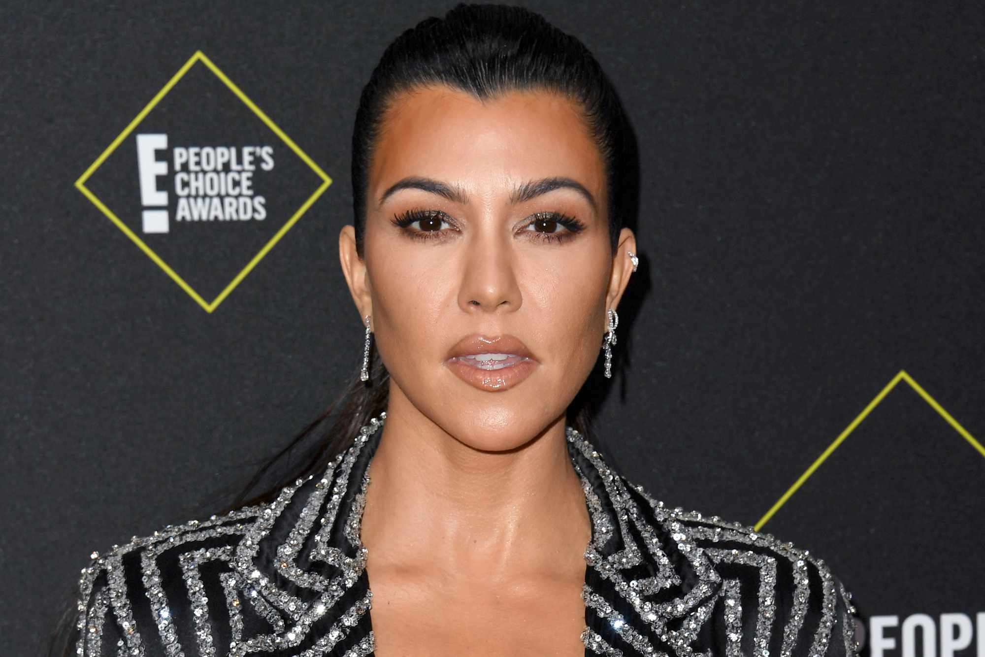 Kourtney Kardashian Holds Rocky in New Candid Family Photos ‘True Love’