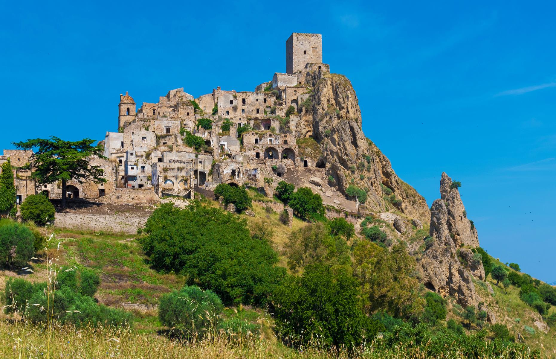 <p>Situated in the southern Italian province of Matera, in one of the world's most beautiful countries, Craco must be among the unluckiest villages in the world. After decades of bearing the brunt of Mother Nature, the town was finally abandoned in 1980.</p>
