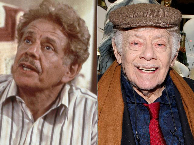 Michael Yarish/NBCU Photo Bank/NBCUniversal/Getty ; Brian Ach/Getty Left: Jerry Stiller as Frank Costanza in 'Seinfeld.' Right: Jerry Stiller at the Unveiling Of The Holiday Windows event on November 14, 2013 in New York City.