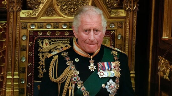 FILE - Prince Charles is seated next to the Queen's crown during the State Opening of Parliament, at the Palace of Westminster in London, May 10, 2022. On Tuesday, Nov. 7, 2023, King Charles III will sit on a gilded throne and read out the King’s Speech, a list of planned laws drawn up by the Conservative government and aimed at winning over voters ahead of an election next year.