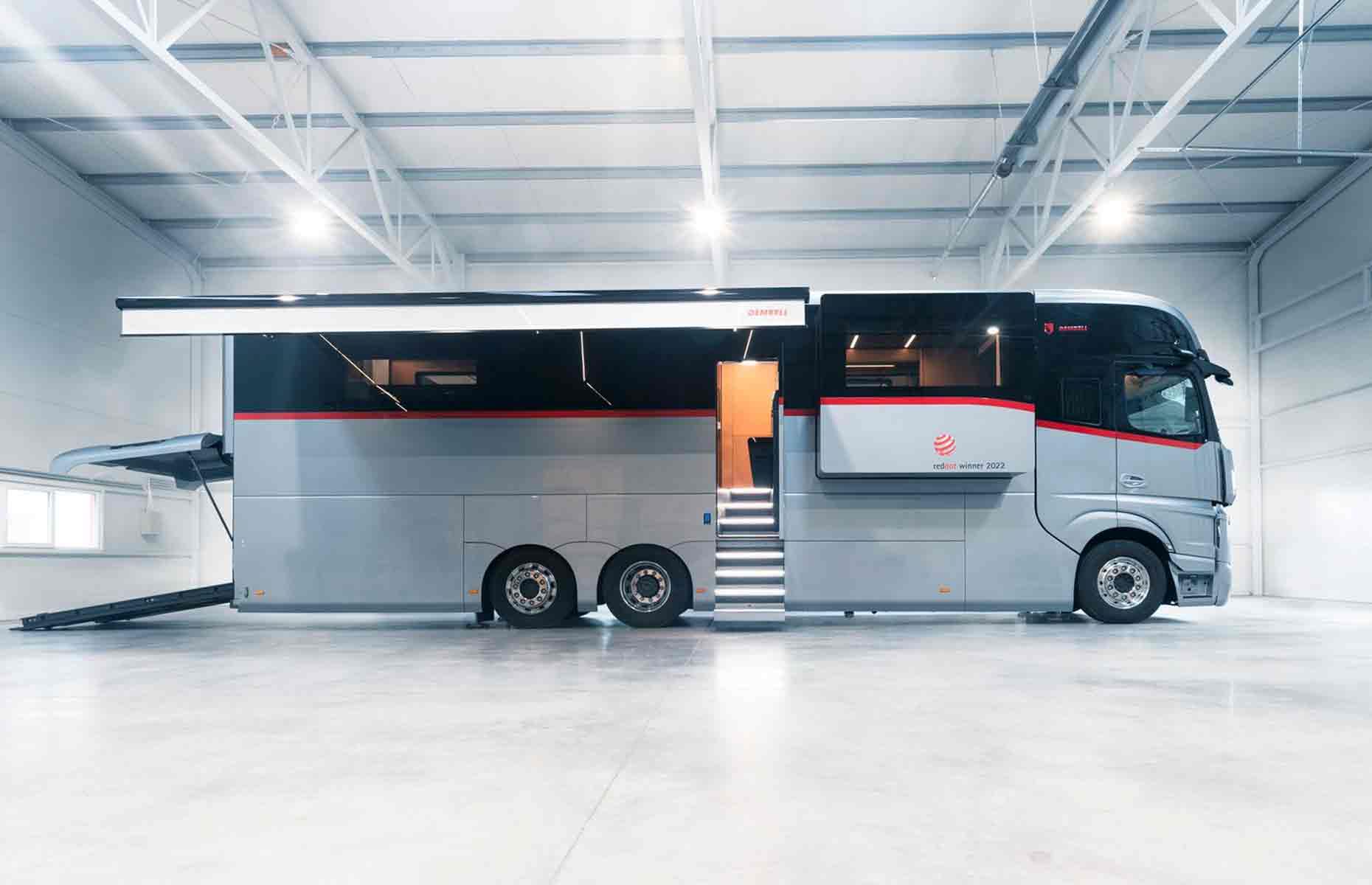 <p>A relatively new name in the world of high-end RVs, <a href="https://www.dembell.com/models/large-garage-modell">Dembell</a> is making waves with its state-of-the-art range of plush land yachts.</p>  <p>Its latest iteration, which was unveiled at the 2022 Dusseldorf Caravan Show before being launched to the general public in the summer of 2023, is decked out with some seriously lavish amenities. </p>  <p>With a <a href="https://www.autoevolution.com/news/the-dembell-motorhome-m-with-large-garage-is-a-futuristic-15-million-landyacht-216105.html">price tag</a> of $1.5 million, the futuristic model is built on a Mercedes-Benz Actros Gigaspace chassis and measures just over 29 feet long and 8.2 feet wide. A sleek aluminum panel across the exterior disguises the RV's party trick – two nifty, hydraulic slide-outs, which expand the interior by a generous 323 square feet.  </p>