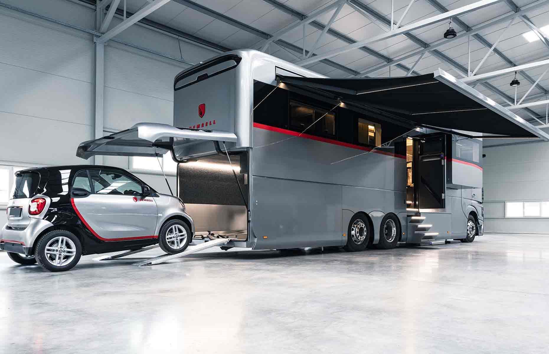 <p>According to Dembell, the motorhome's power uptake is similar to that of a detached house. To support its energy needs, the RV's smart electrical system includes six 330-watt solar panels mounted to the roof. </p>  <p>Most remarkably of all, however, is the large garage nestled in the underbelly. The cavernous space can accommodate a car of up to 13 feet long, and it's also fitted out with hydraulic tracks that can draw parked vehicles up into the storage compartment. A hydraulic lift can adjust the ceiling height for taller cars, while ensuring the bedroom above the garage remains functional. </p>