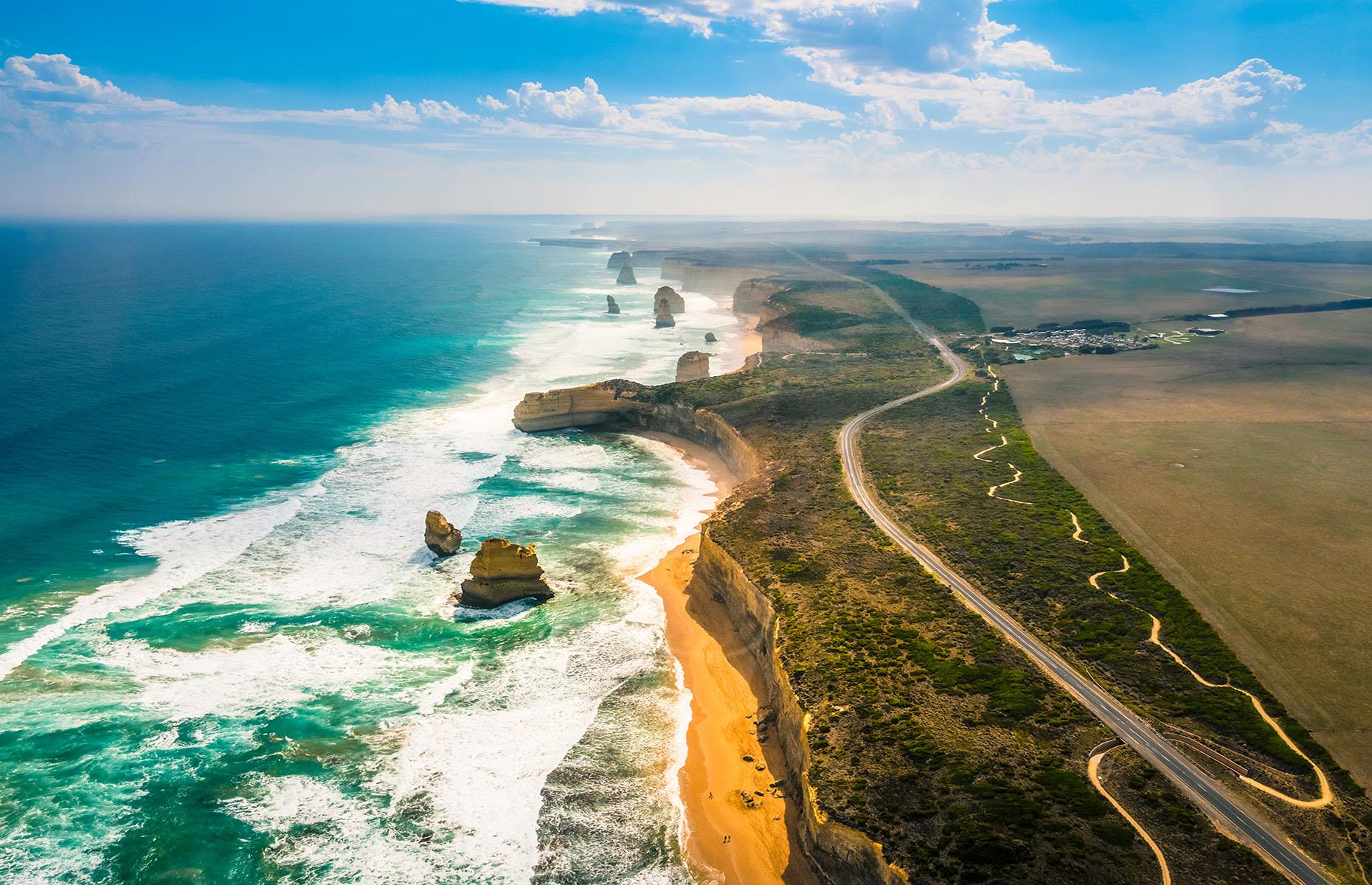 <p>Australia’s Great Ocean Road skirts along Victoria's coast to the border with South Australia, with jaw-dropping views at every stretch. Start in Torquay, Victoria to take the 148-mile (243km) route west that takes in golden arcs of secluded sand, verdant rainforest and plunging cliffs.</p>  <p>The coastline's most famous rock formations can be seen in <a href="http://www.visitvictoria.com/regions/Great-Ocean-Road/Things-to-do/Nature-and-wildlife/National-parks-and-reserves/Port-Campbell-National-Park.aspx">Port Campbell National Park</a>, towards the end of the route, including the Twelve Apostles. Although sadly erosion has seen to it that only eight of these magnificent rocks remain.</p>