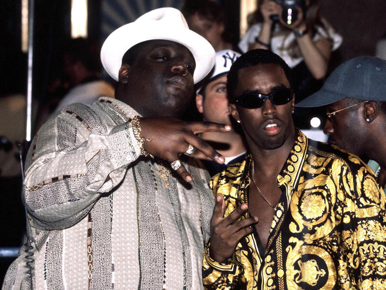 The Notorious B.I.G. with Combs (Erik Pendzich/REX)