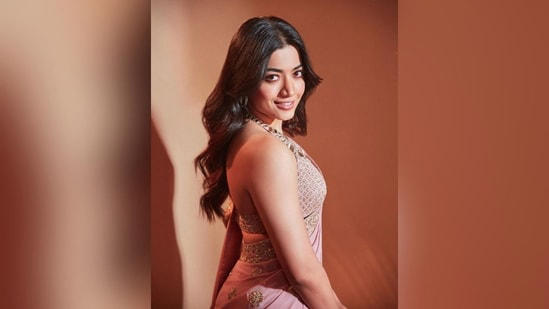 With the help of hairstylist Priyanka Borkar, Rashmika styled her lush locks into soft curls and left them open in the centre part, which cascaded beautifully down her shoulders to complete her look.
