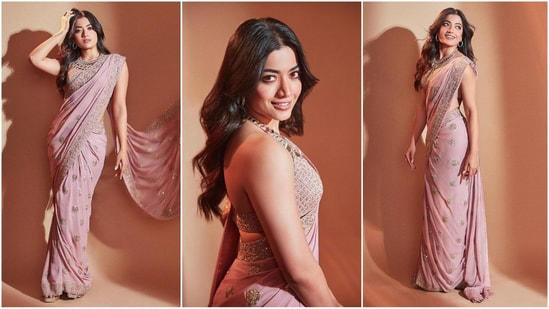 Rashmika Mandanna is currently gearing up for the release of her upcoming film Animal and her gorgeous back to back promotional looks in breathtaking sarees are stealing our hearts. The beautiful actress is a total stunner and can pull off any look to perfection whether it's a casual dress or a traditional suit. Earlier she sizzled in a lovely black saree and this time in a light pink gold work adorned saree, she proves her fashion finesses. With the wedding season upon us, Rashmika's saree looks will definitely inspire your ethnic wardrobe. Scroll down to take some fashion notes.