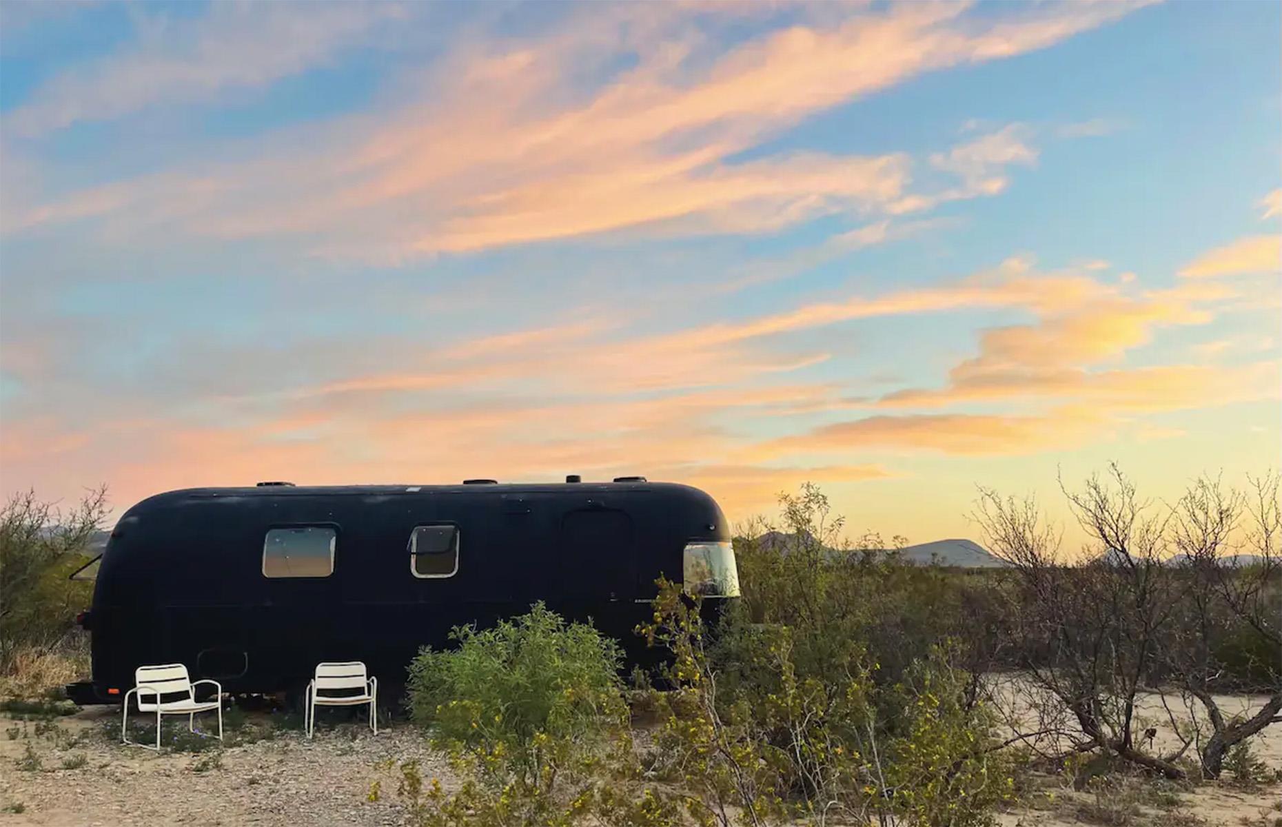 <p>This sleek black Airstream, located within Terlingua Ranch in Texas, has been dramatically remodeled for optimal comfort and style.</p>  <p>Black Moon, as the Airstream has been dubbed, has been designed to maximize the breathtaking desert landscape surrounding it, with a grilling area and firepit provided so you can enjoy a cookout under the stars.</p>