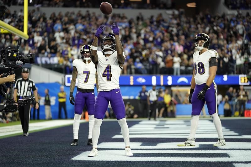 zay flowers catches and runs for tds, ravens force 4 turnovers in 20-10 win over chargers