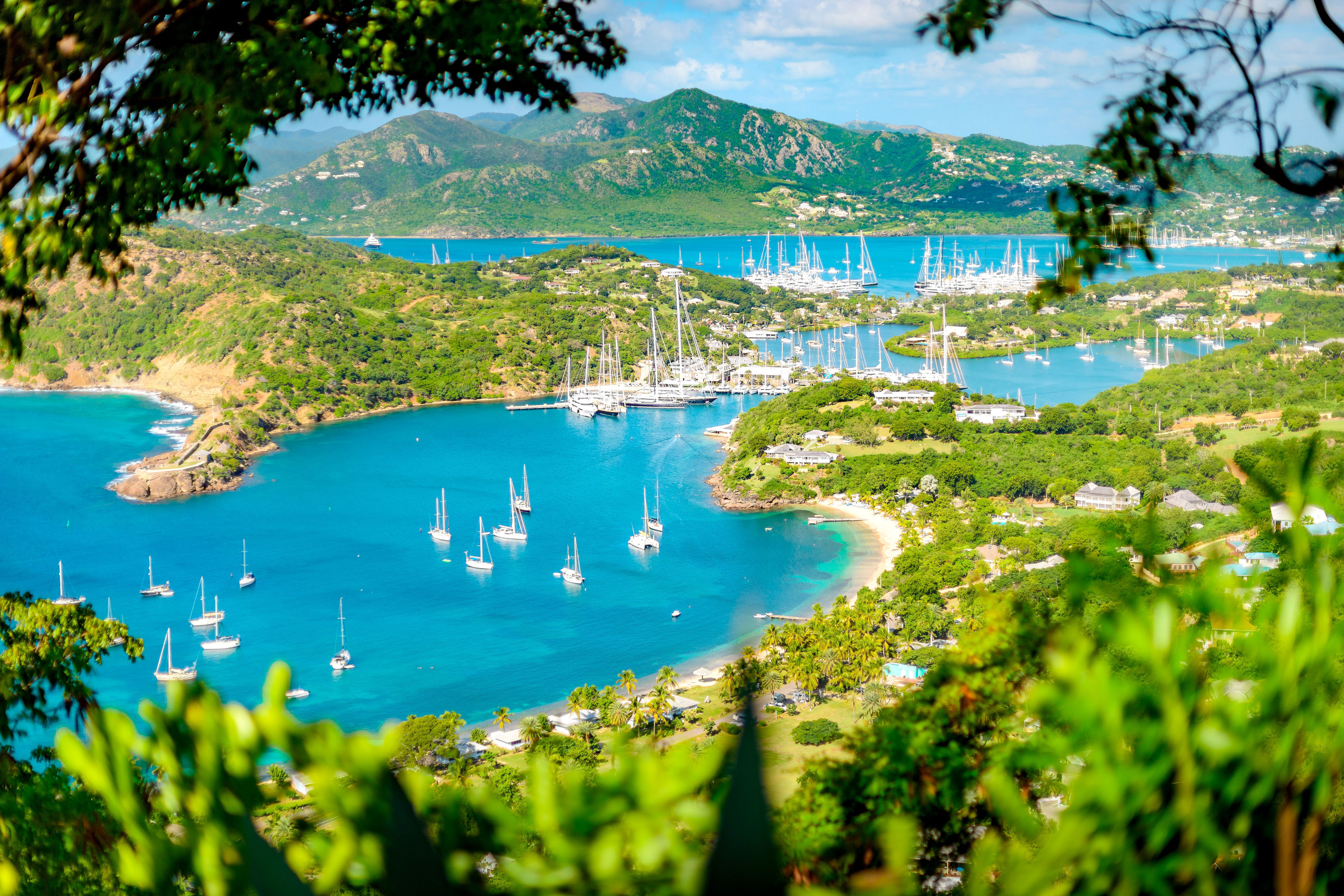 <p>Antigua mixes tropical beauty with British history—just look at the candy-colored colonial buildings and much-touted 365 beaches to choose from. The island is also a must-visit for any <a href="https://www.cntraveler.com/gallery/caribbean-island-finder-sailing?mbid=synd_msn_rss&utm_source=msn&utm_medium=syndication">sailing fans</a> out there. During the first two weeks of April, hundreds of yachts from around the world converge for the island’s annual Classic Yacht Regatta and Sailing Week. On race days, people gather atop Shirley Heights to get the best views of the boat-filled English Harbour.</p> <p>Even if you visit on non-yachting holidays, Shirley Heights should be on your itinerary: Looking out over the harbor’s curved coastline is a truly unforgettable experience, with Sunday BBQs to boot.</p><p>Sign up to receive the latest news, expert tips, and inspiration on all things travel</p><a href="https://www.cntraveler.com/newsletter/the-daily?sourceCode=msnsend">Inspire Me</a>