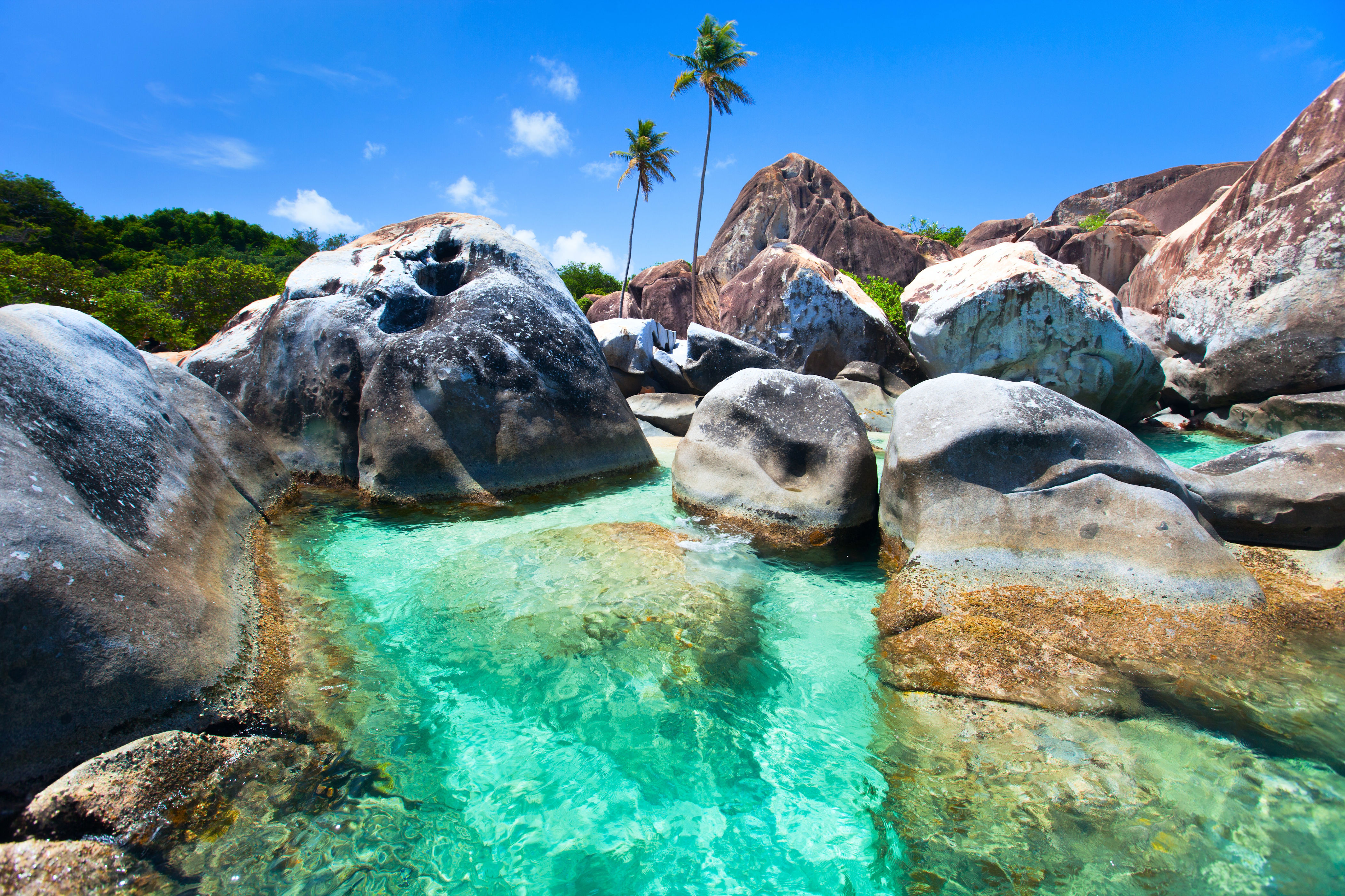 <p>Virgin Gorda is the third-largest of the British Virgin Islands, with natural beauty covering virtually all of its 8.5 square miles. The island offers quiet beaches, coves, and flora-filled national parks.</p> <p>Perhaps the prettiest and most popular attraction is the Baths, pictured, a seaside area where huge granite boulders form scenic saltwater pools and grottos.</p><p>Sign up to receive the latest news, expert tips, and inspiration on all things travel</p><a href="https://www.cntraveler.com/newsletter/the-daily?sourceCode=msnsend">Inspire Me</a>