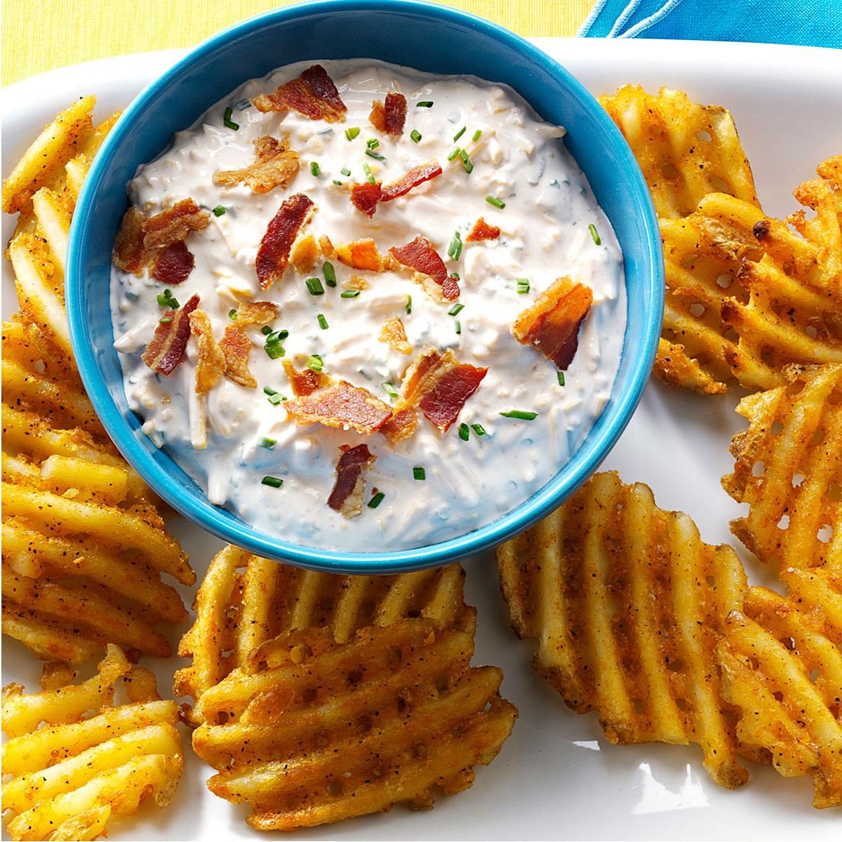 <p>I never thought of using waffle-cut fries as a scoop for dip until a friend of mine did at a baby shower. They’re ideal for my cheesy bacon and chive dip, which tastes just like a baked potato topper. —Betsy King, Duluth, Minnesota</p> <div class="listicle-page__buttons"> <div class="listicle-page__cta-button"><a href='https://www.tasteofhome.com/recipes/loaded-baked-potato-dip/'>Go to Recipe</a></div> </div>