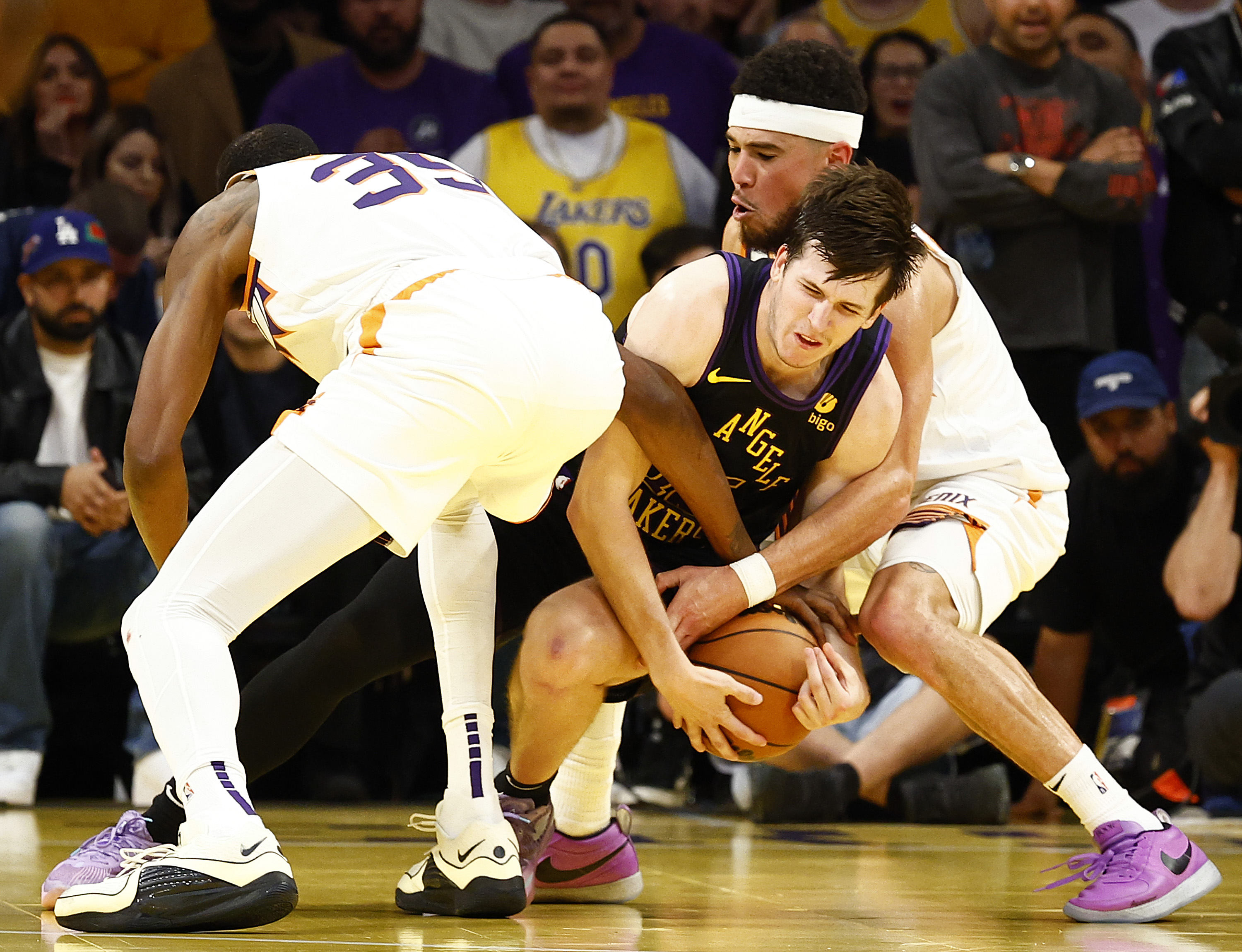 lakers beat suns amid nba tournament’s first big officiating controversy