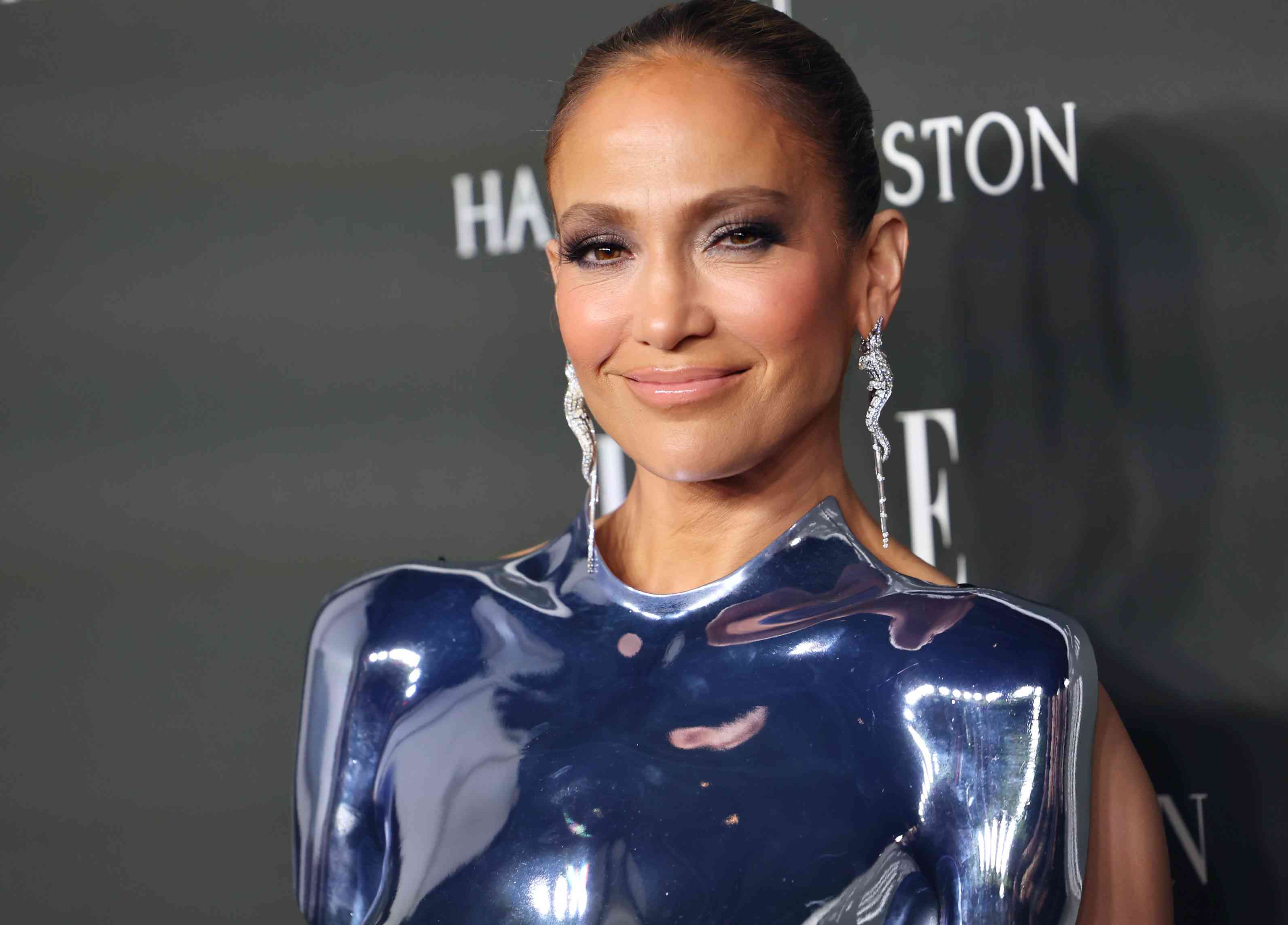 Jennifer Lopez Paired Her Underboob Baring Cut Out Dress With A Chrome Breastplate