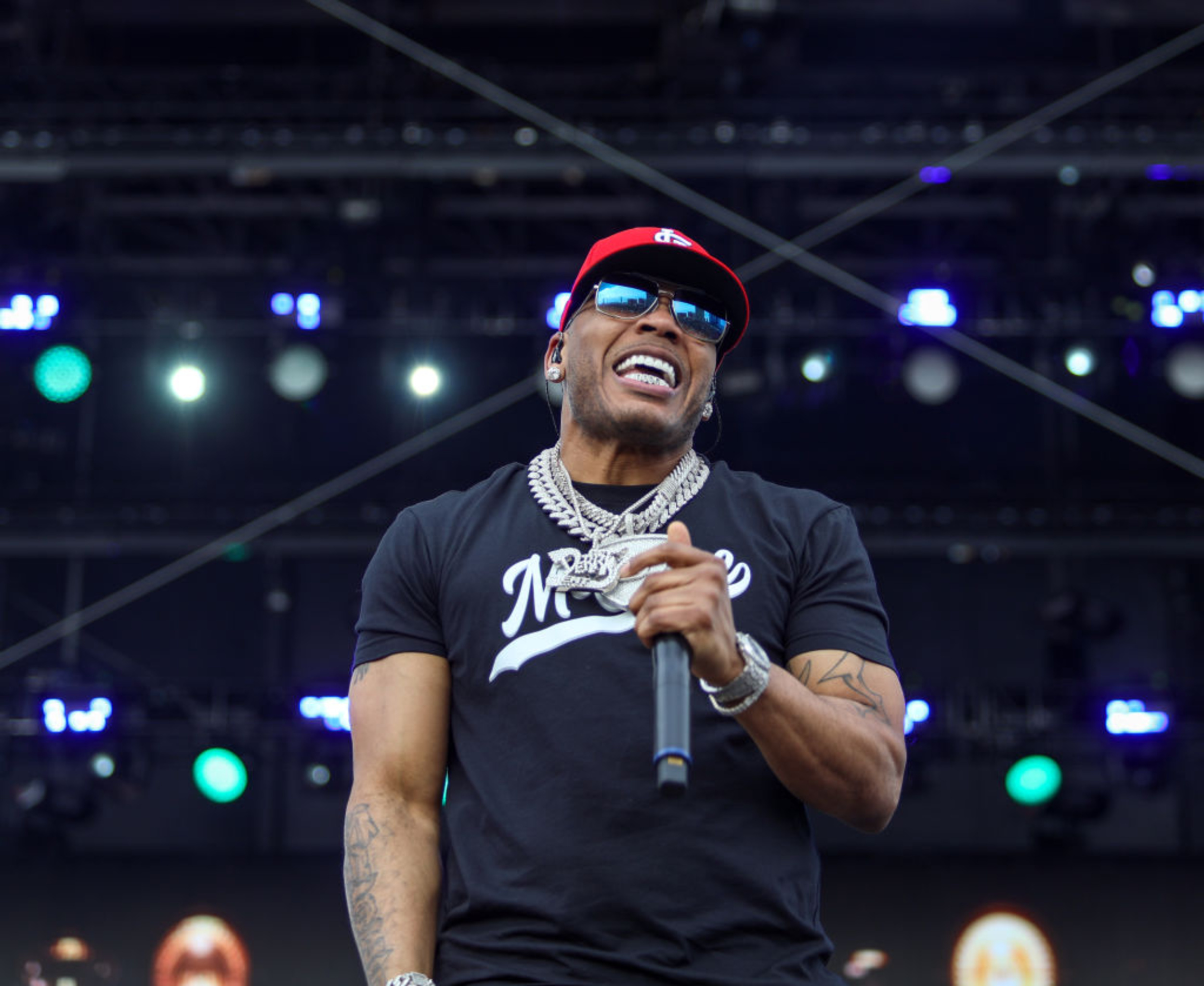 <p>On Nelly’s 2000 single <a href="https://www.youtube.com/watch?v=RtSDWq6HsJE" rel="noopener noreferrer">“Ride Wit Me,”</a> the rapper highlights his early career successes, including meeting women at the club, sitting on flights next to Vanna White, and driving fly cars. As he raps on the hook, “If you wanna go and take a ride with me / We 3-wheelin' in the fo’ with the gold D’s / Oh, why do I live this way? / Hey, must be the money!” </p><p>You may also like: <a href='https://www.yardbarker.com/entertainment/articles/27_of_the_geekiest_celebrities_120623/s1__38989713'>27 of the geekiest celebrities</a></p>
