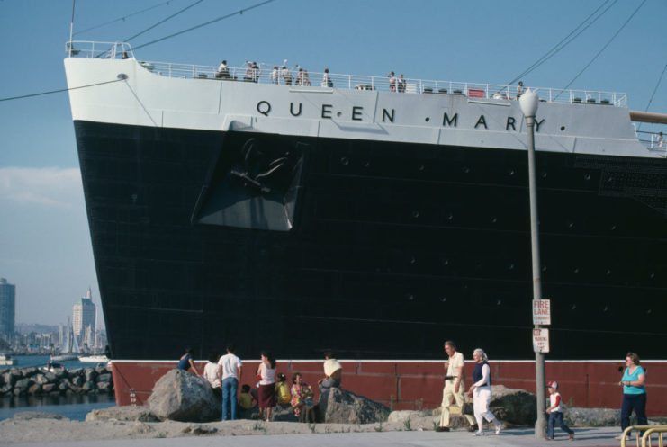 <p>The RMS <em>Queen Mary</em> is a legendary British ocean liner that sailed the North Atlantic for decades before retiring in December 1967. She operated throughout the course of the <a href="https://www.warhistoryonline.com/world-war-ii/van-barfoot.html" rel="noopener">Second World War</a>, and was given escorts to ensure her voyages weren't put at risk by <a href="https://www.warhistoryonline.com/instant-articles/horrors-of-serving-a-u-boat.html" rel="noopener">German U-boats</a>. Today, the ship is docked in California and is known for being one of the <a href="https://www.travelandleisure.com/hotels-resorts/most-haunted-hotel-america-queen-mary" rel="noopener">most haunted vessels</a> in the world.</p> <p>During the <em>Pearl Harbor</em> movie, Ben Affleck's character, Capt. Rafe McCawley, is onboard a vessel that floats past the <em>Queen Mary</em>. She's sporting her traditional red, white and black color scheme, which isn't historically accurate, as the ocean liner was painted grey during World War II. This more muted color scheme allowed for her to better camouflage while at sea.</p>