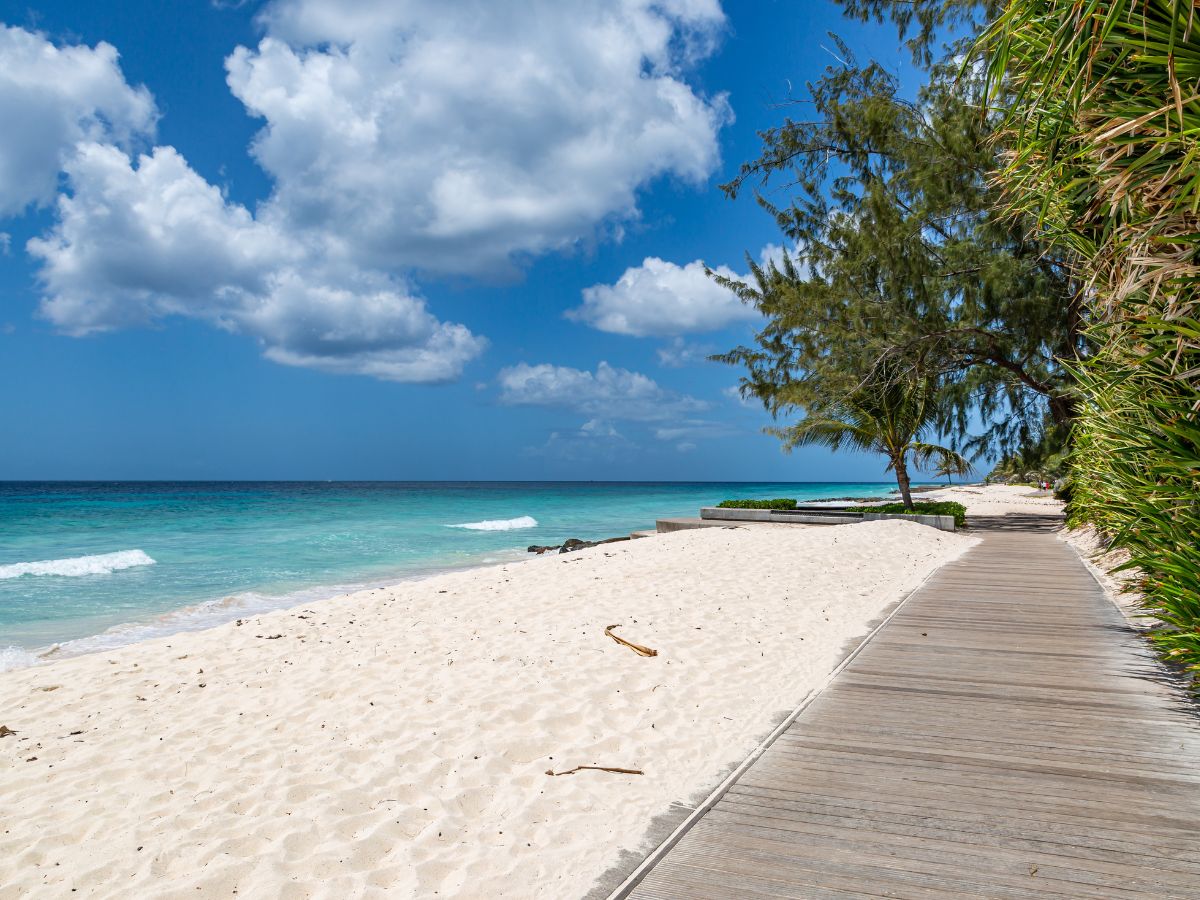 The Richard Haynes Boardwalk in Barbados is a scenic walkway that offers breathtaking views of the Caribbean Sea, stretching along the south coast of the island.