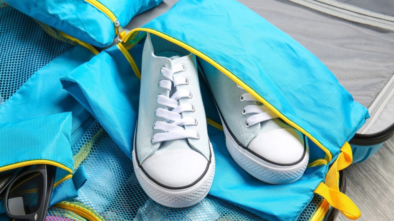 <p>If you travel with a separate bag or case for your shoes, you can also store your unclean laundry there. Place the laundry that needs washing in a small plastic or cloth bag, seal it, and put the bag in with your shoes. This step ensures your soiled laundry won’t mix in with your clean clothes, and by keeping them with your shoes, you’ll remember that they need to be washed.</p>
