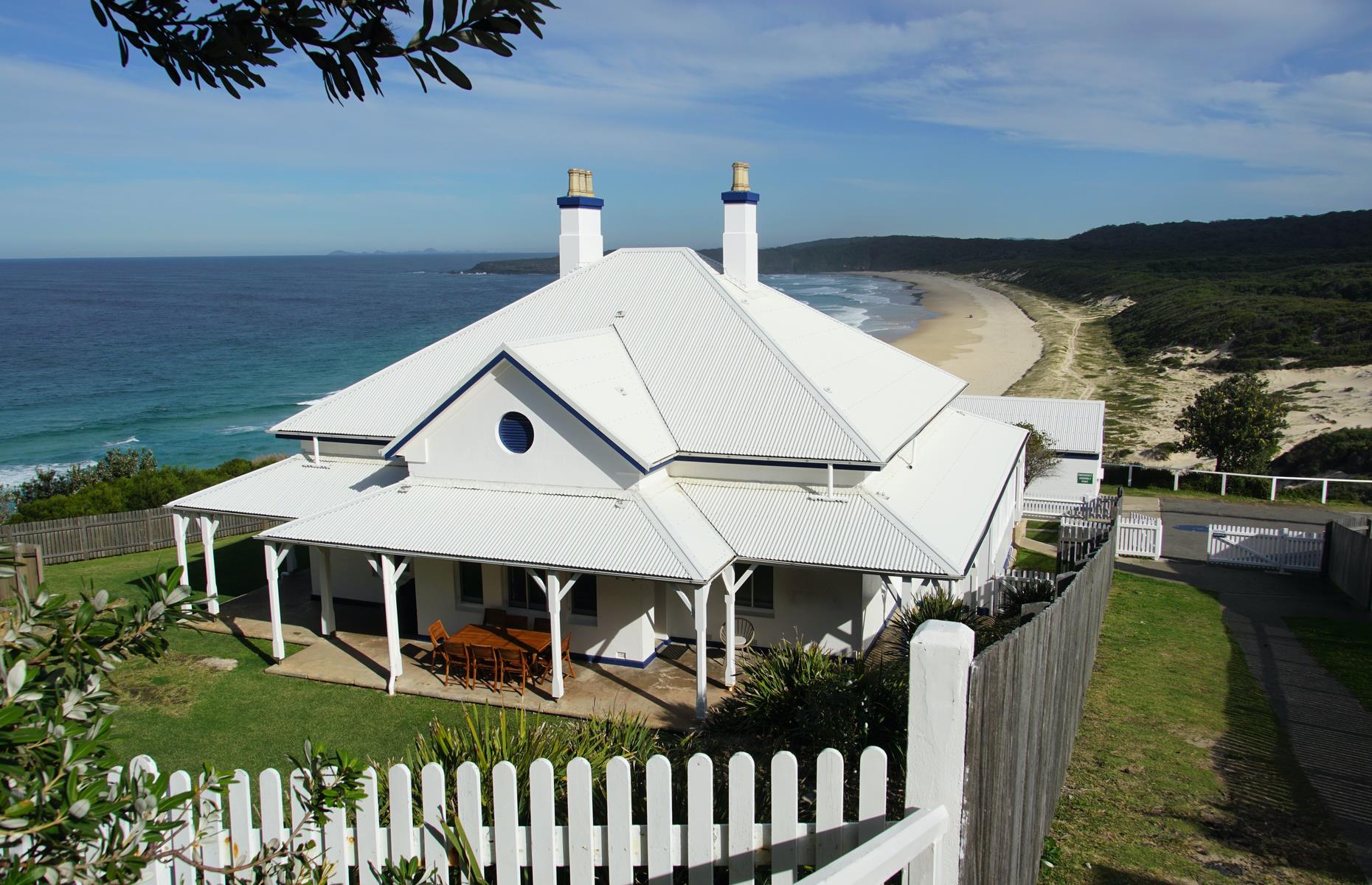 <p>Set on the mid-north coast of New South Wales, Pacific Palms is a collection of small and sleepy coastal villages, lakes, forest and spectacular beaches (standouts are Boomerang Beach, Blueys Beach and Elizabeth Beach). Soak in the views from 19th-century Sugarloaf Point Lighthouse (pictured), east of Seal Rocks village. You can stay here too. Catch the waves and go snorkelling at Blueys Beach or set off on a hike from Elizabeth Bay into Booti Booti National Park. You can follow a walking trail at the beach’s northern end towards Seven Mile beach, a noted whale-watching spot in winter.</p>