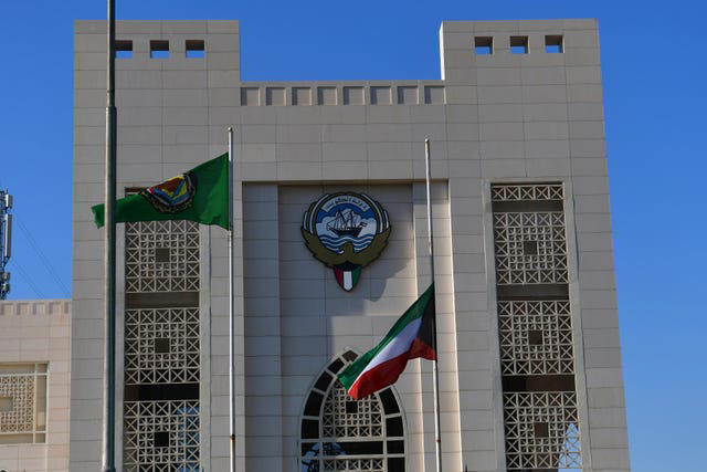 The national flag flying at half mast after the death of Sheikh Nawaf Al Ahmad Al Sabah in Kuwait (AP Photo/Jaber Abdulkhaleg)