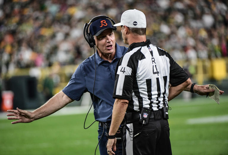Chicago Bears head coach Matt Eberflus challenges a call to referee Craig Wrolstad in the fourth quarter during game against the Green Bay Packers at Lambeau Field.