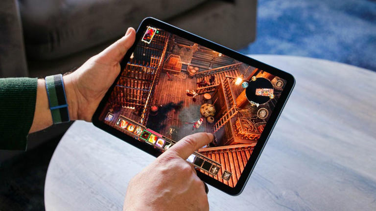 Apple didn't invent tablet computers, but its iPad line revolutionized the category. Scott Stein/CNET