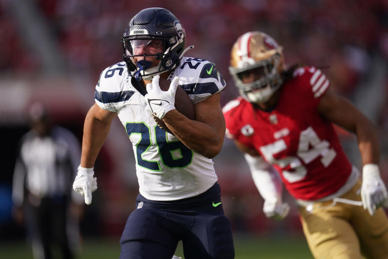 Seattle Seahawks RB Zach Charbonnet (26) rushes the ball against the San Francisco 49ers.