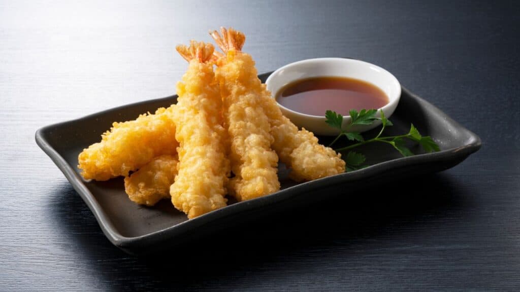 <p><span>Tempura involves seafood and vegetables that have been battered and deep-fried, resulting in a light, crispy coating. It's often served with a dipping sauce or sprinkled with salt to enhance its delicate flavor.</span></p>