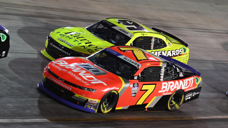 BRISTOL, TN - SEPTEMBER 15: Teammates Justin Allgaier (#7 JR Motorsports BRANDT Chevrolet) and Brandon Jones (#9 JR Motorsports Menards/Patriot Lighting Chevrolet) race side by side during the running of the NASCAR Xfinity Series Playoff Food City 300 on September 15, 2023, at Bristol Motor Speedway in Bristol, TN. (Photo by Jeffrey Vest/Icon Sportswire via Getty Images)